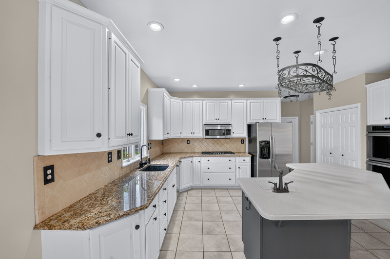 Bright, carefully composed kitchen photographed by Slate Imaging