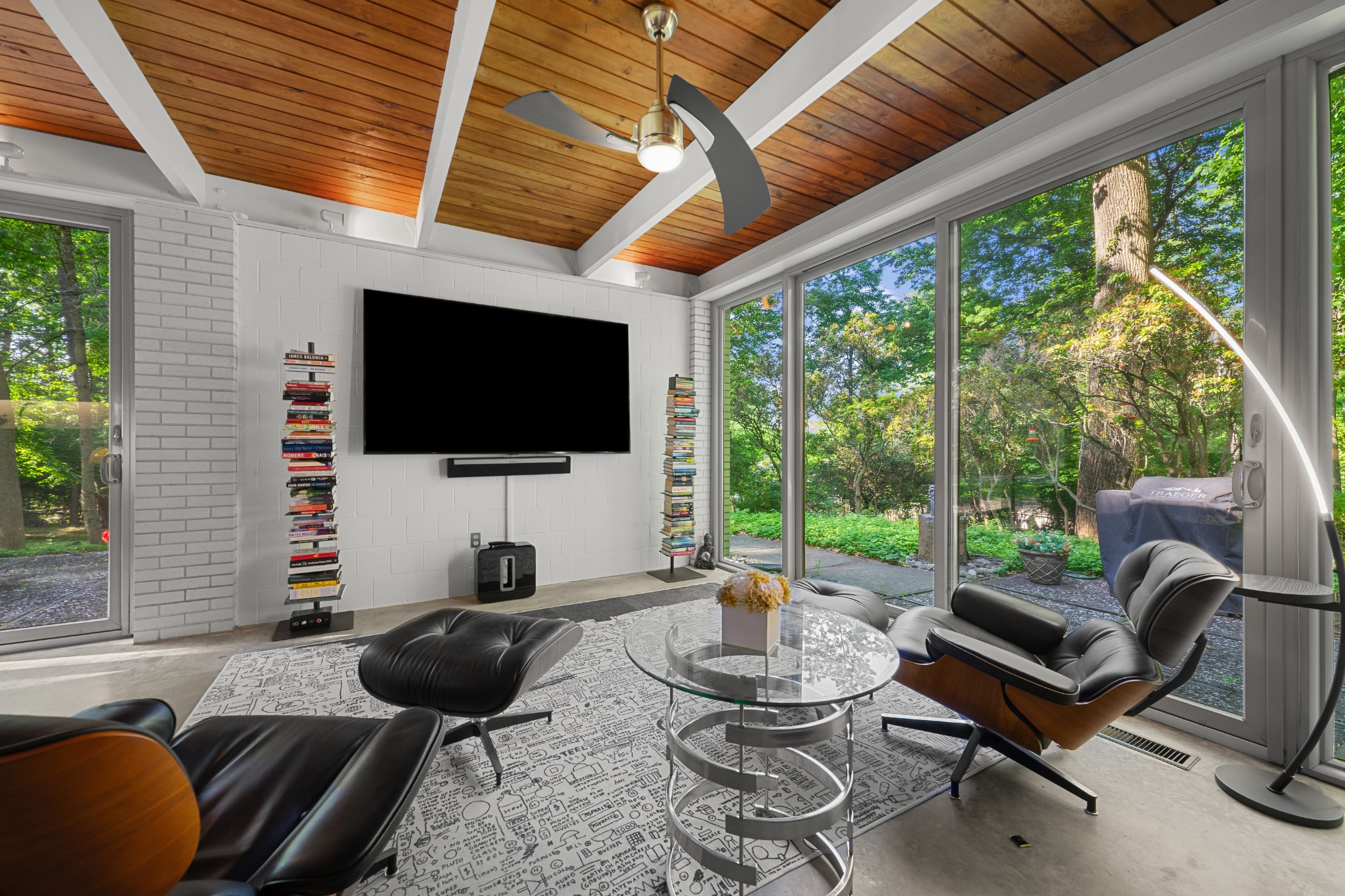 Residential sunroom with floor-to-ceiling windows