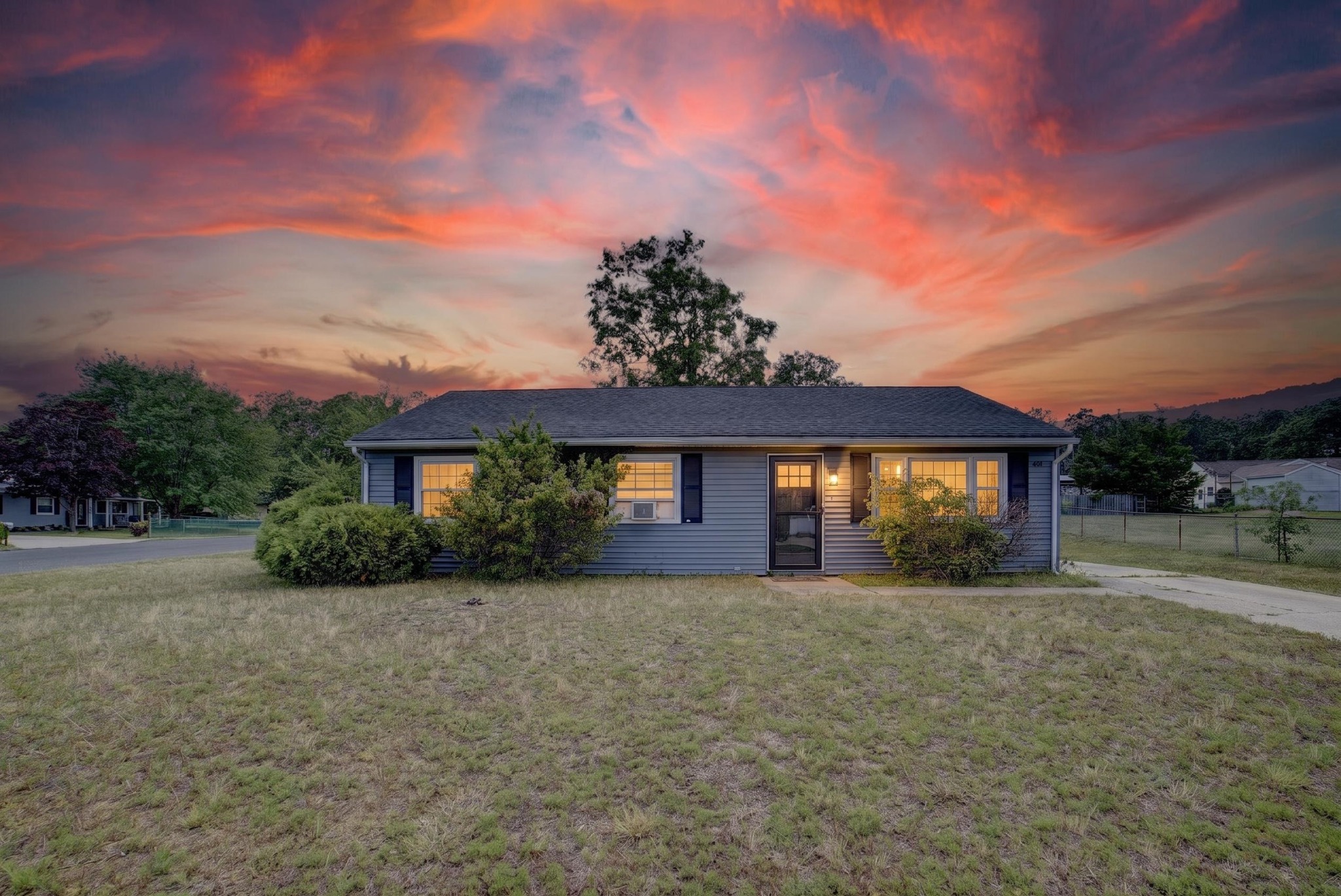 Residential ranch home photographed at twilight